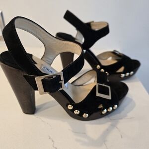 Elegant Black Heeled Sandals with Gold Accents